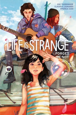 Paperback of Life Is Strange: Forget-Me-Not comic by Titan Comics, featuring cover art with characters and title text.