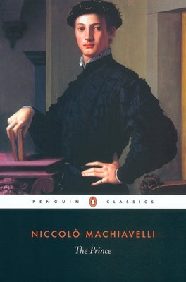 Paperback copy of "The Prince" by Penguin Classics featuring a dark cover with gold lettering and classic design elements.