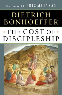 Paperback of The Cost of Discipleship by Touchstone Books, showing the book cover with title and author details.