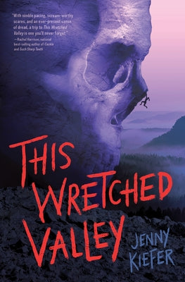 Paperback copy of "This Wretched Valley" by Quirk Books, featuring the book cover with dark, moody artwork.