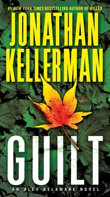 Mass market paperback of "Guilt" by Ballantine Books, showing the book cover with title and author details.