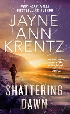 Mass market paperback of "Shattering Dawn" by Berkley Books, featuring cover art with a dramatic sunrise scene.