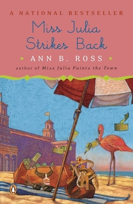 Paperback of Miss Julia Strikes Back by Penguin Books, featuring the book cover with colorful illustrations and title text.