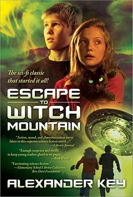 Paperback copy of "Escape to Witch Mountain" by Sourcebooks Young Readers, showing the book cover with mystical illustrations.