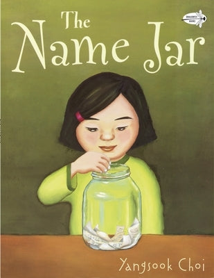 Paperback copy of The Name Jar by Dragonfly Books, showing the book cover with colorful title and illustration.