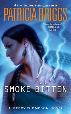 Smoke Bitten mass market paperback by Ace Books, featuring a dark, smoky cover with mysterious artwork.