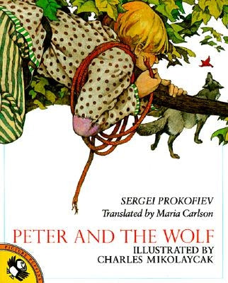 Paperback of Peter and the Wolf storybook by Puffin Books, featuring colorful cover art with illustrations of characters and animals.