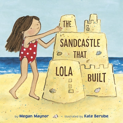Paperback copy of "The Sandcastle That Lola Built" by Dragonfly Books, showing the book cover with colorful seaside illustration.