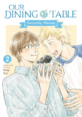 Paperback of "Our Dining Table: Seconds, Please! Vol. 2" by Seven Seas featuring a colorful, illustrated cover depicting a cozy dining scene.