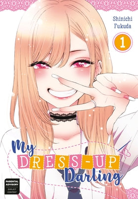 Square Enix Manga My Dress-Up Darling 01 paperback featuring colorful cover art with manga characters and title text.