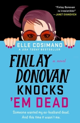 Paperback of Finlay Donovan Knocks 'em Dead by Minotaur Books featuring the book cover with title and author's name.