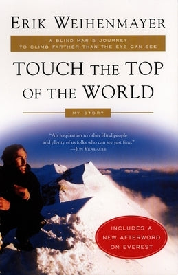 Paperback of "Touch the Top of the World" by Plume Books, featuring a cover with an inspiring mountain climb scene.