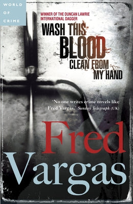 Paperback of "Wash This Blood Clean from My Hand" by Penguin Books, featuring the book cover with dark and red artwork.