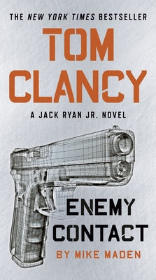 Mass market paperback of "Tom Clancy Enemy Contact" by Berkley Books, showing the book cover with bold title and author name.