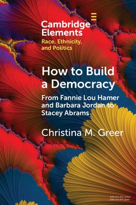 Paperback book titled "How to Build a Democracy" by Cambridge University Press, showing the front cover with text and design.