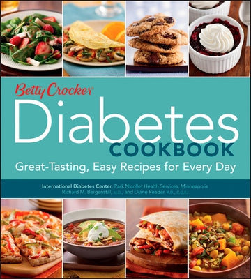 Paperback Betty Crocker Diabetes Cookbook by Houghton Mifflin featuring colorful recipe pages and a cover with the title visible.