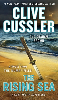 Mass market paperback of "The Rising Sea" by G.P. Putnam's Sons, showing the book cover with ocean-themed artwork.