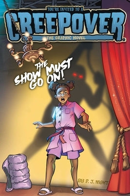 Paperback graphic novel titled The Show Must Go On! by Simon Spotlight, featuring colorful cover art and vibrant illustrations.