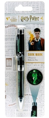 Harry Potter Dark Mark projector pen resting on a paperback book, featuring a sleek black design with magical detailing.