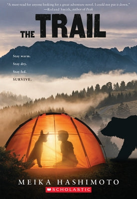 Paperback copy of The Trail by Scholastic Inc., showing the book cover with outdoor trail imagery and title text.