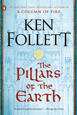 Paperback copy of The Pillars of the Earth by Penguin Books, showing the book cover with title and author details.