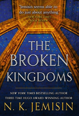 Paperback of The Broken Kingdoms by Orbit featuring a dark fantasy book cover with mystical artwork.
