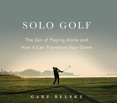 Paperback book titled "Solo Golf: The Zen of Playing Alone" by Workman Publishing, featuring a cover with a golf scene.