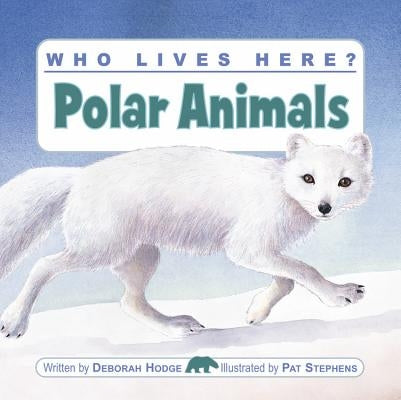 Paperback book titled "Who Lives Here? Polar Animals" by Kids Can Press, featuring illustrations of polar animals on the cover.