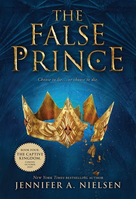 Paperback of The False Prince by Scholastic Paperbacks, first book in the Ascendance Series, showing the cover with title and author.