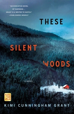 Paperback of These Silent Woods by Minotaur Books featuring a forest scene with trees and a tranquil outdoor setting.