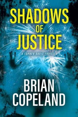 Paperback copy of Shadows of Justice by Topher Davis, a thriller novel published by Black Odyssey Media, showing the book cover.