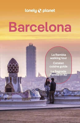 Paperback Lonely Planet Barcelona travel guide with detailed city maps and vibrant cover design.