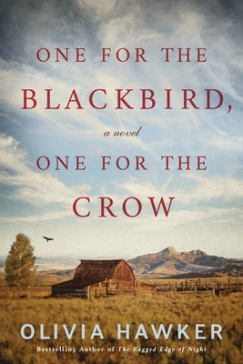 Paperback of "One for the Blackbird, One for the Crow" by Lake Union Publishing, showing the book cover with title and author details.