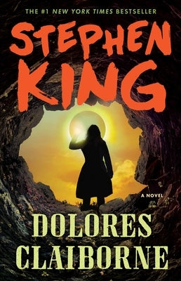 Paperback of Dolores Claiborne novel by Scribner Book Company featuring the book cover with title and author details.