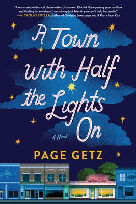 Paperback of "A Town with Half the Lights On" by Sourcebooks Landmark, showing the book cover with cityscape illustration.