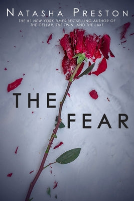 Paperback copy of "The Fear" by Delacorte Press, featuring a dark cover with mysterious imagery.