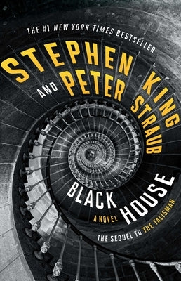 Paperback of Black House by Scribner Book Company, featuring the book cover with dark imagery and title text.