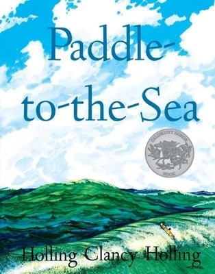 Paperback copy of Paddle-To-The-Sea by Clarion Books, showing the book cover with colorful illustrations and title text.