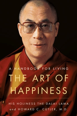 Paperback copy of "The Art of Happiness: A Handbook for Living" by Riverhead Books featuring the book cover with title and author name.