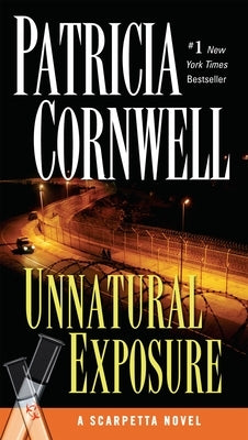Mass market paperbound book cover of "Unnatural Exposure: Scarpetta" by Berkley Books featuring a dark, mysterious design.
