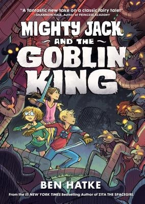 Paperback of Mighty Jack and the Goblin King comic book by First Second, featuring colorful cover art with fantasy characters.