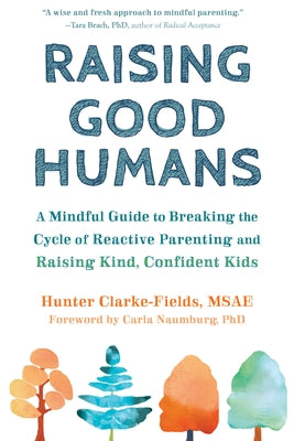 Paperback of "Raising Good Humans" by New Harbinger Publications, showing the book cover with a mindful parenting theme.