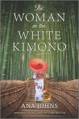 Paperback of The Woman in the White Kimono by Park Row, featuring the book cover with Japanese-inspired artwork.
