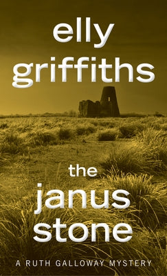 Mass market paperbound of "The Janus Stone: A Mystery" by William Morrow & Company, featuring a mysterious cover design.