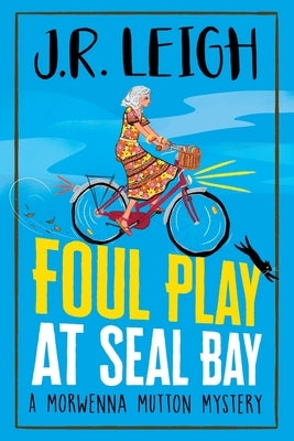 Paperback of "Foul Play at Seal Bay" by Boldwood Books Ltd, showing the book cover with seabed and lighthouse illustration.