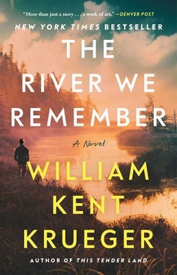 Paperback of "The River We Remember" by Atria Books, featuring the book cover with river and nature imagery.