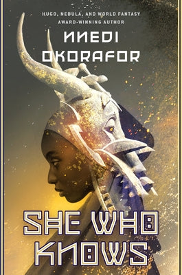 Paperback of "She Who Knows" by Daw Books, featuring a fantasy novel cover with mystical artwork and title text.