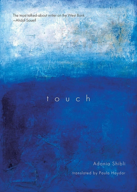 Paperback copy of the novel "Touch" by Clockroot Books featuring the book cover with title and author details.