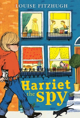 Paperback copy of Harriet the Spy by Yearling Books, featuring the book cover with illustrations and title.