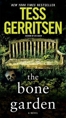 Mass market paperback of "The Bone Garden" by Ballantine Books, featuring dark, haunting cover art with skeletal imagery.